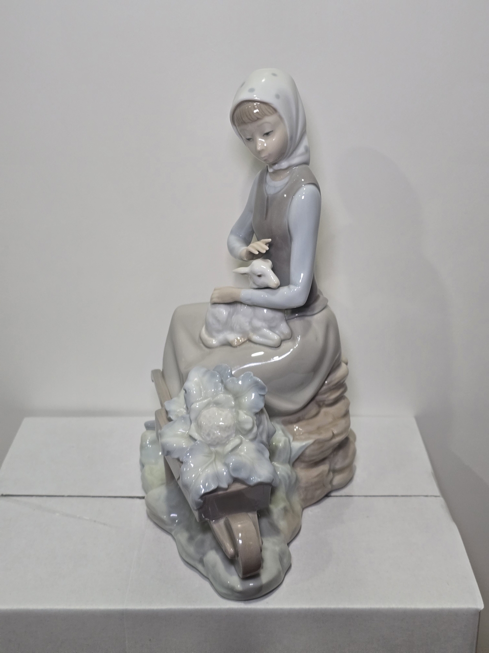 Lladro Porcelain Figurine in Cream, Gray and Pale Blue